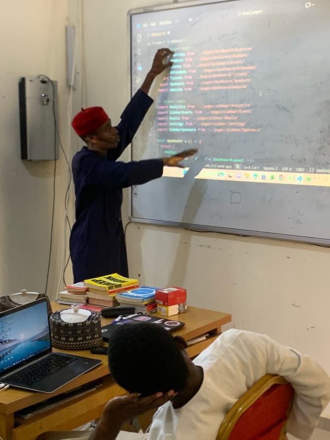 Students working from desks inside Silicon Rube