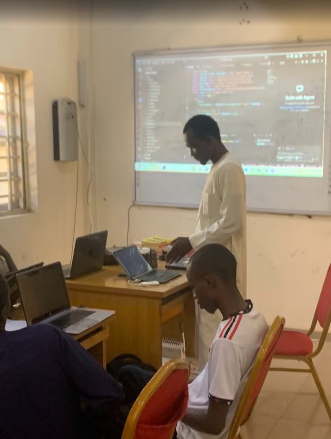 GeekInk students coding together during a practical learning session